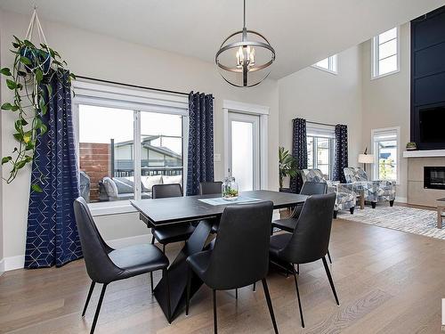 44 Amesbury Wynd, Sherwood Park, AB - Indoor Photo Showing Dining Room With Fireplace