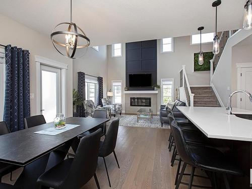 44 Amesbury Wynd, Sherwood Park, AB - Indoor Photo Showing Dining Room With Fireplace