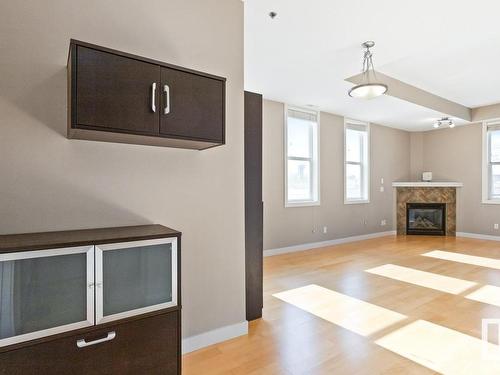 204 8223 99 Street, Edmonton, AB - Indoor Photo Showing Living Room With Fireplace