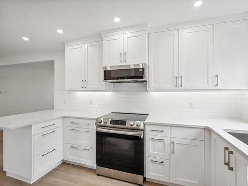 Edmonton, AB - Indoor Photo Showing Kitchen With Upgraded Kitchen