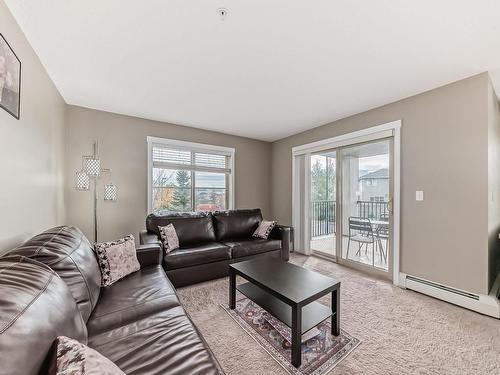 202 5390 Chappelle Road, Edmonton, AB - Indoor Photo Showing Living Room