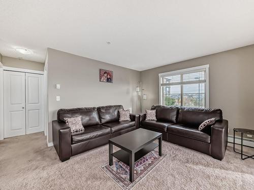 202 5390 Chappelle Road, Edmonton, AB - Indoor Photo Showing Living Room