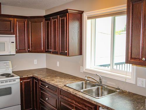 4932 46 Avenue, St. Paul Town, AB - Indoor Photo Showing Kitchen With Double Sink