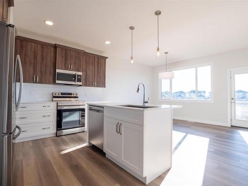 25 Waverly Way, Fort Saskatchewan, AB - Indoor Photo Showing Kitchen With Stainless Steel Kitchen With Upgraded Kitchen