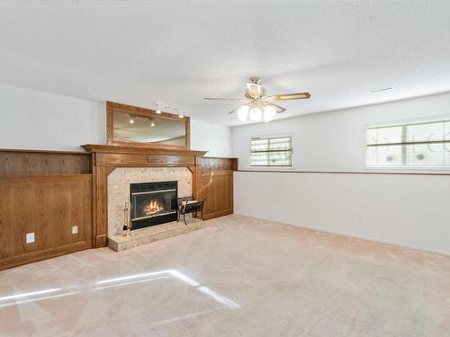 17207 91 Street, Edmonton, AB - Indoor Photo Showing Living Room With Fireplace