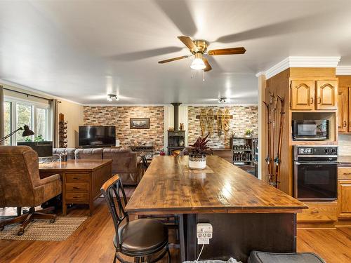 48030B Rge Road 85, Rural Brazeau County, AB - Indoor Photo Showing Dining Room With Fireplace