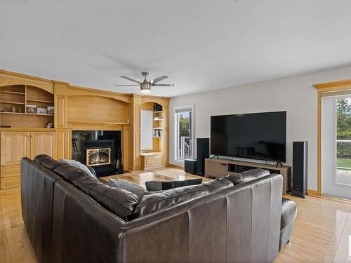 277 52514 Rge Road 223, Rural Strathcona County, AB - Indoor Photo Showing Living Room With Fireplace