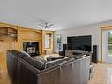 277 52514 Rge Road 223, Rural Strathcona County, AB  - Indoor Photo Showing Living Room With Fireplace 