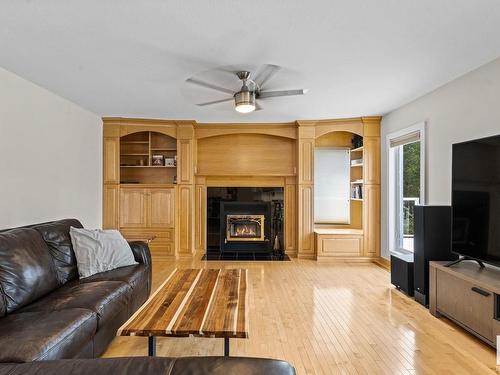 277 52514 Rge Road 223, Rural Strathcona County, AB - Indoor Photo Showing Living Room With Fireplace