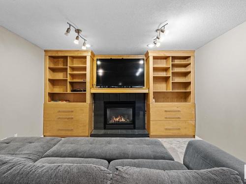 277 52514 Rge Road 223, Rural Strathcona County, AB - Indoor Photo Showing Living Room With Fireplace