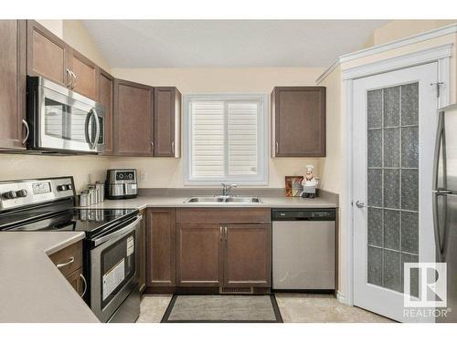 1566 34A Avenue, Edmonton, AB - Indoor Photo Showing Kitchen With Double Sink