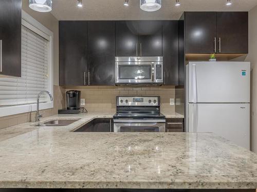 28 9515 160 Avenue, Edmonton, AB - Indoor Photo Showing Kitchen With Double Sink With Upgraded Kitchen