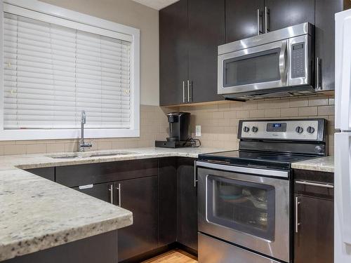 28 9515 160 Avenue, Edmonton, AB - Indoor Photo Showing Kitchen With Upgraded Kitchen