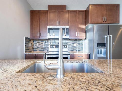 2501 10238 103 Street, Edmonton, AB - Indoor Photo Showing Kitchen With Double Sink With Upgraded Kitchen