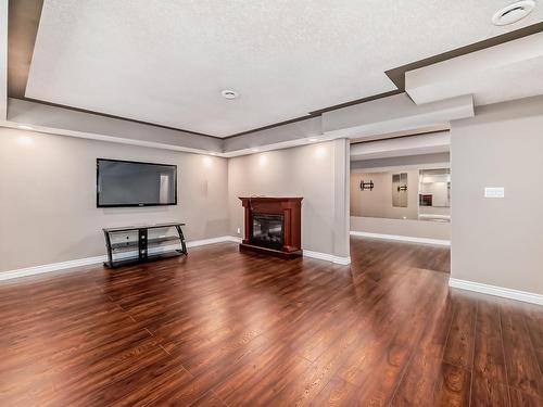 1528 Cunningham Cape, Edmonton, AB - Indoor With Fireplace