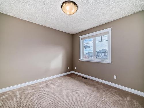 1528 Cunningham Cape, Edmonton, AB - Indoor Photo Showing Other Room