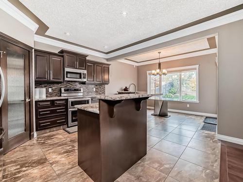 1528 Cunningham Cape, Edmonton, AB - Indoor Photo Showing Kitchen With Upgraded Kitchen