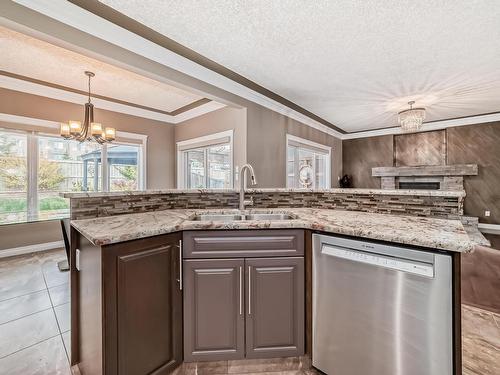 1528 Cunningham Cape, Edmonton, AB - Indoor Photo Showing Kitchen With Double Sink