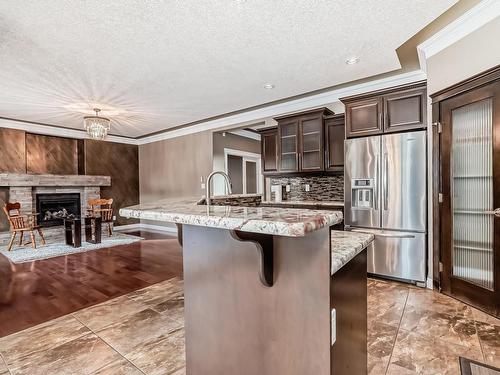 1528 Cunningham Cape, Edmonton, AB - Indoor Photo Showing Kitchen With Upgraded Kitchen