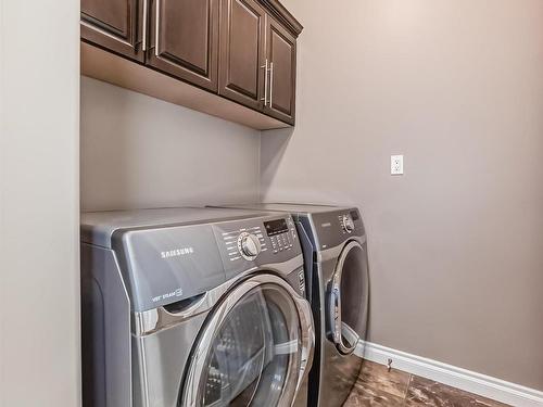 1528 Cunningham Cape, Edmonton, AB - Indoor Photo Showing Laundry Room