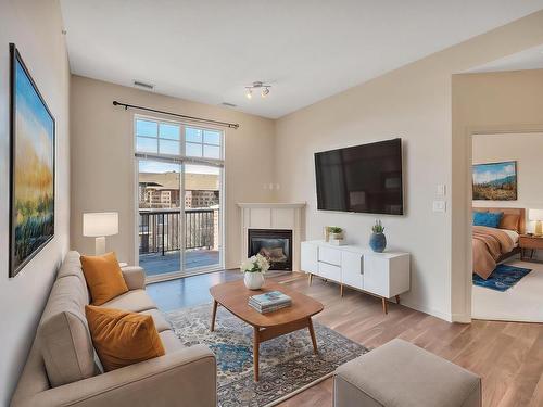 318 2503 Hanna Crescent, Edmonton, AB - Indoor Photo Showing Living Room With Fireplace