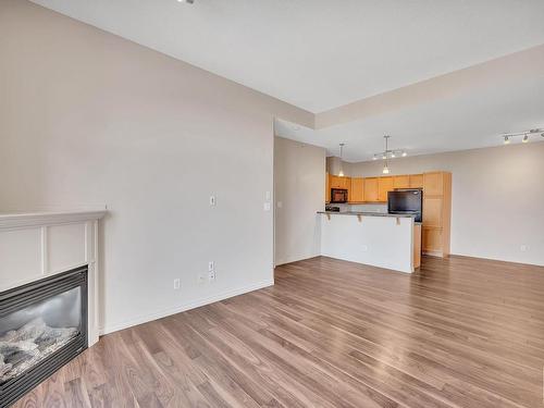 318 2503 Hanna Crescent, Edmonton, AB - Indoor With Fireplace