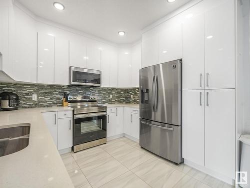 6056 179 Avenue, Edmonton, AB - Indoor Photo Showing Kitchen With Double Sink With Upgraded Kitchen