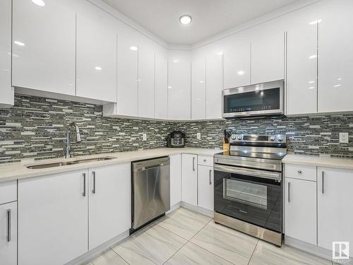 6056 179 Avenue, Edmonton, AB - Indoor Photo Showing Kitchen With Double Sink With Upgraded Kitchen