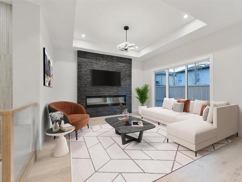 5 Darby Crescent, Spruce Grove, AB - Indoor Photo Showing Living Room With Fireplace