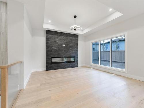 5 Darby Crescent, Spruce Grove, AB - Indoor Photo Showing Living Room With Fireplace