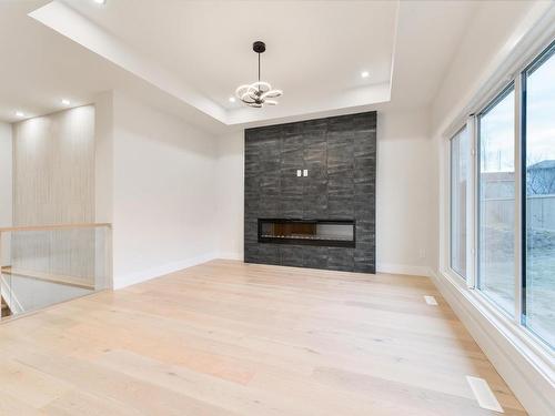 5 Darby Crescent, Spruce Grove, AB - Indoor Photo Showing Living Room With Fireplace