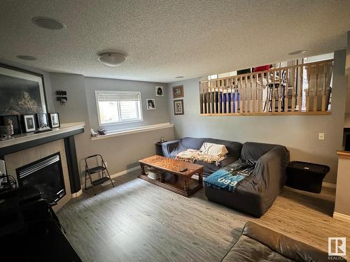 21315 91 Avenue, Edmonton, AB - Indoor Photo Showing Living Room With Fireplace