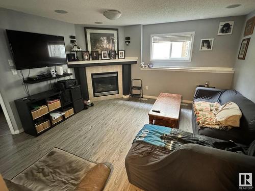 21315 91 Avenue, Edmonton, AB - Indoor Photo Showing Living Room With Fireplace