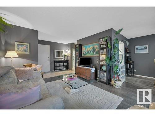 201 5125 Riverbend Road, Edmonton, AB - Indoor Photo Showing Living Room