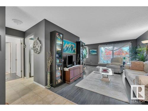 201 5125 Riverbend Road, Edmonton, AB - Indoor Photo Showing Living Room