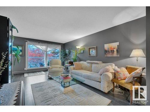 201 5125 Riverbend Road, Edmonton, AB - Indoor Photo Showing Living Room