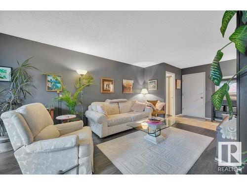 201 5125 Riverbend Road, Edmonton, AB - Indoor Photo Showing Living Room