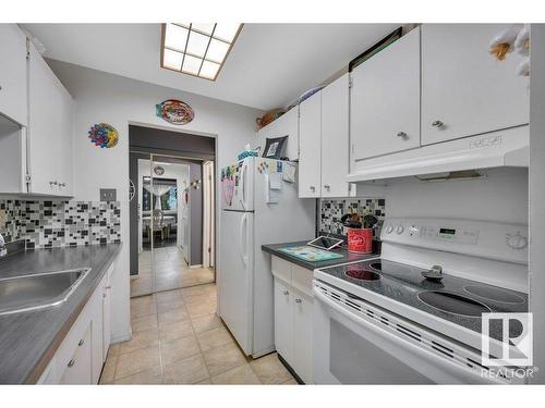 201 5125 Riverbend Road, Edmonton, AB - Indoor Photo Showing Kitchen