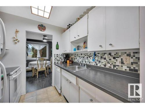 201 5125 Riverbend Road, Edmonton, AB - Indoor Photo Showing Kitchen