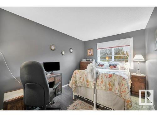 201 5125 Riverbend Road, Edmonton, AB - Indoor Photo Showing Bedroom