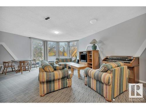 201 5125 Riverbend Road, Edmonton, AB - Indoor Photo Showing Living Room