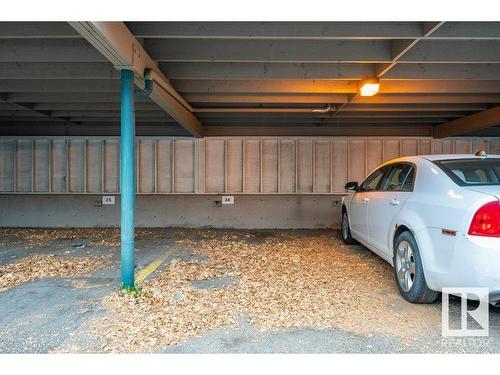 201 5125 Riverbend Road, Edmonton, AB - Indoor Photo Showing Garage