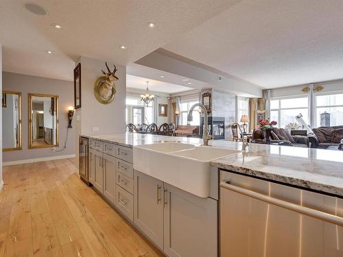 2004 9020 Jasper Avenue, Edmonton, AB - Indoor Photo Showing Kitchen With Double Sink