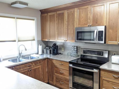 6002 50 Street, Vegreville, AB - Indoor Photo Showing Kitchen With Double Sink