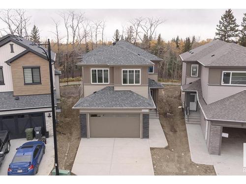 672 Astoria Way, Devon, AB - Outdoor With Facade