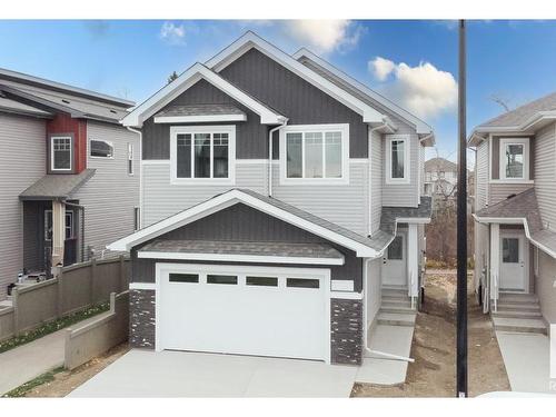 672 Astoria Way, Devon, AB - Outdoor With Facade