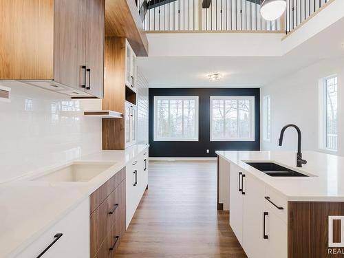 672 Astoria Way, Devon, AB - Indoor Photo Showing Kitchen With Double Sink