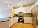 410 4304 139 Avenue, Edmonton, AB  - Indoor Photo Showing Kitchen With Stainless Steel Kitchen With Double Sink 