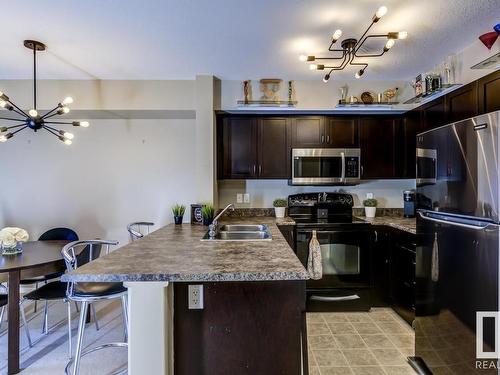 220 42 Summerwood Boulevard, Sherwood Park, AB - Indoor Photo Showing Kitchen With Double Sink