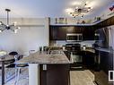 220 42 Summerwood Boulevard, Sherwood Park, AB  - Indoor Photo Showing Kitchen With Double Sink 